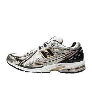 New Balance 1906 goud