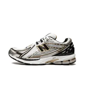 New Balance 1906 goud