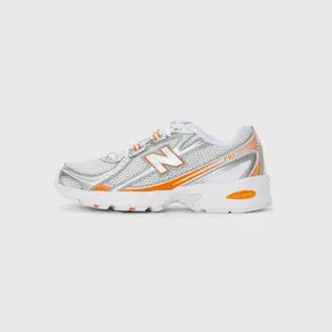 New Balance 740 oranje