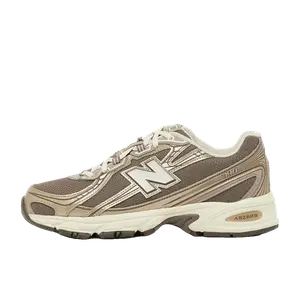 New Balance 740 goud