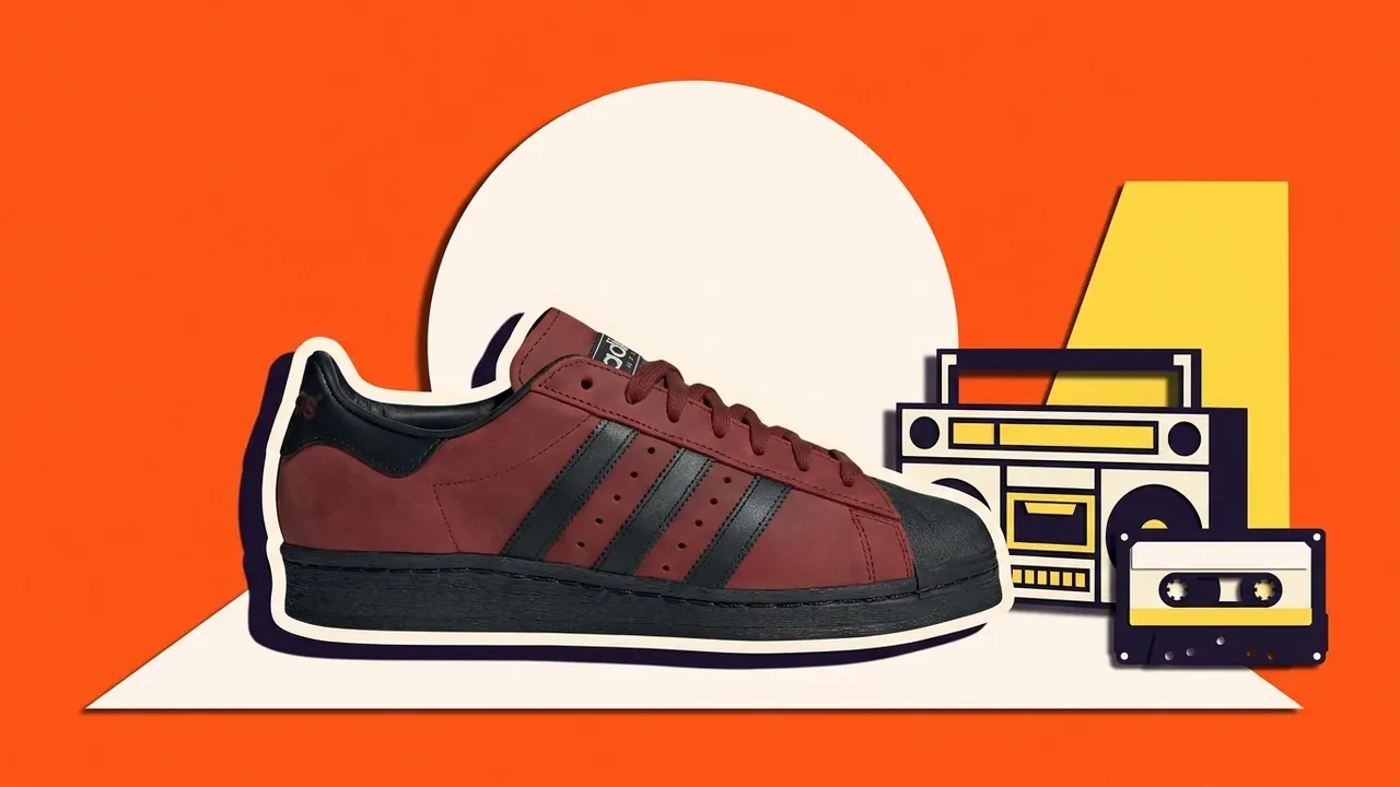 adidas Superstar op een podium naast een boombox en een cassettebandje, als papiercollage